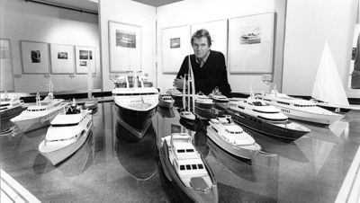 Jon Bannenberg with models of superyachts