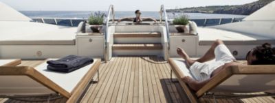 Enjoying the sundeck of a charter yacht